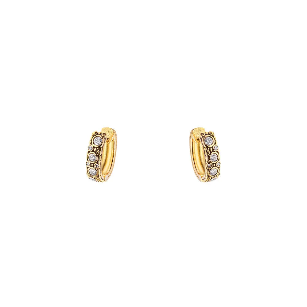 18 karat yellow gold oval hoops with diamonds