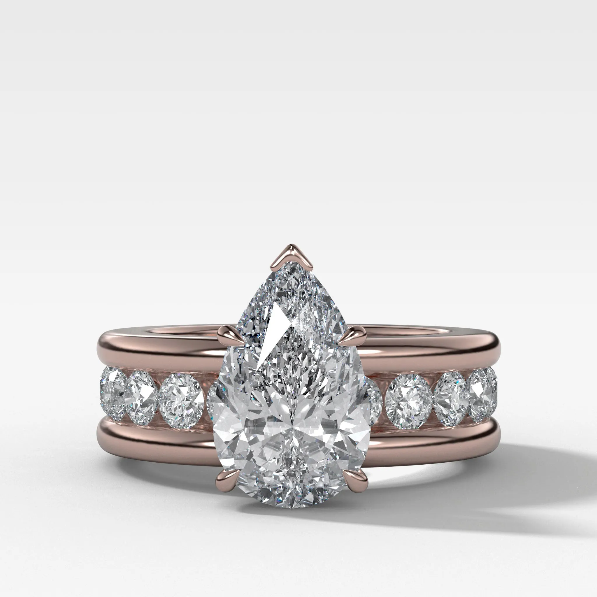 Chunky Channel Set Engagement Ring with Pear Cut Diamond