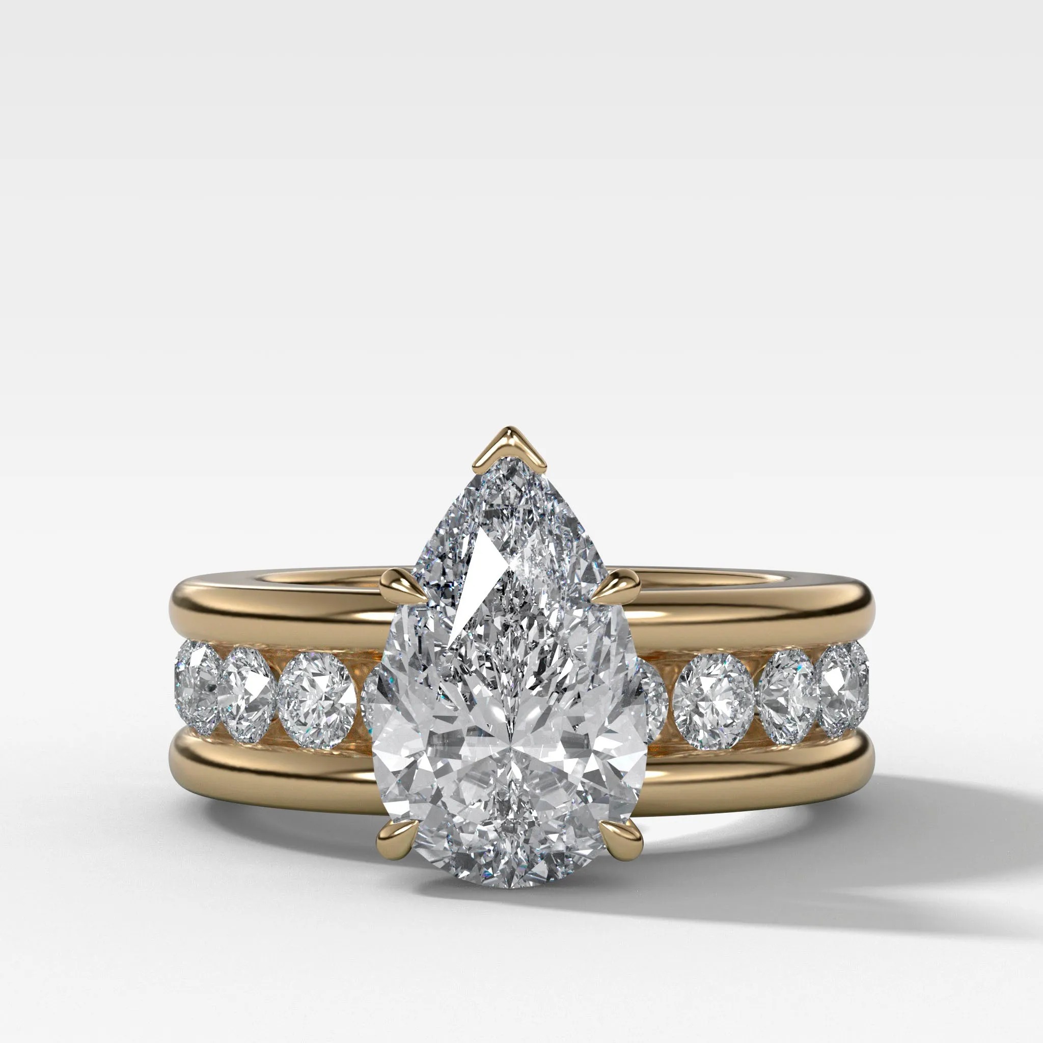 Chunky Channel Set Engagement Ring with Pear Cut Diamond