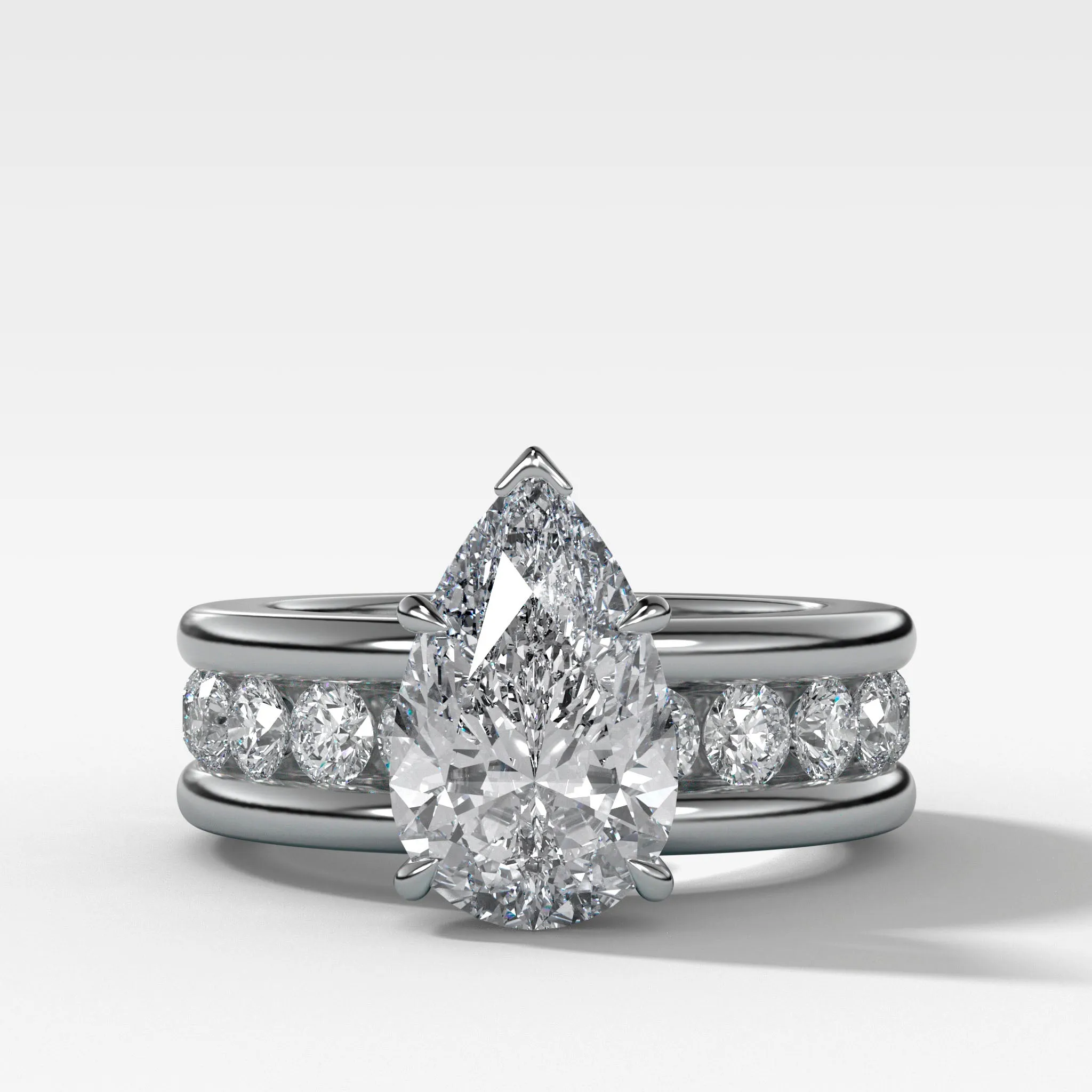 Chunky Channel Set Engagement Ring with Pear Cut Diamond