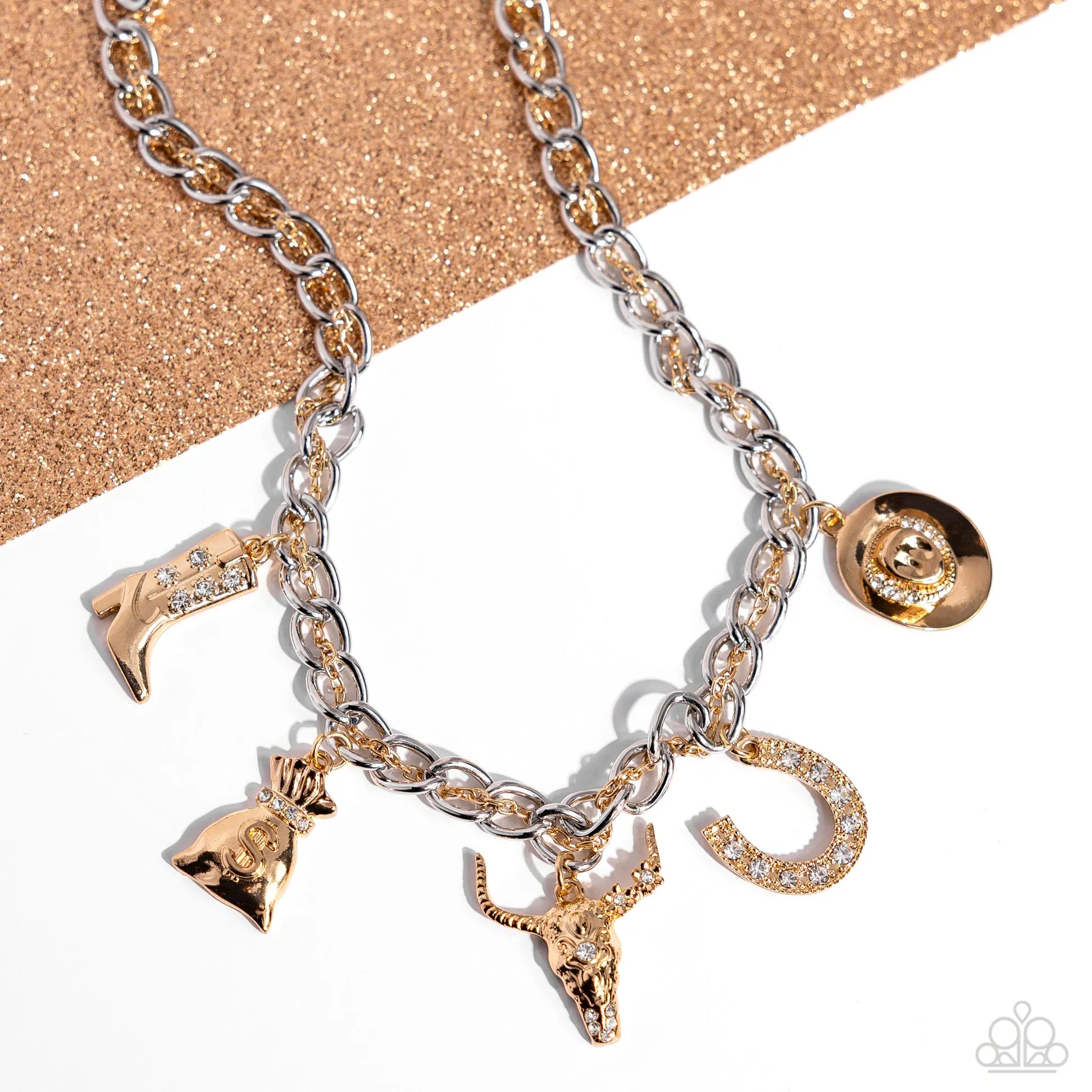 Cowboy Collection - Gold - Mixed Metal and White Rhinestone Western Charm Paparazzi Short Necklace - 2024 Empower Me Pink Exclusive