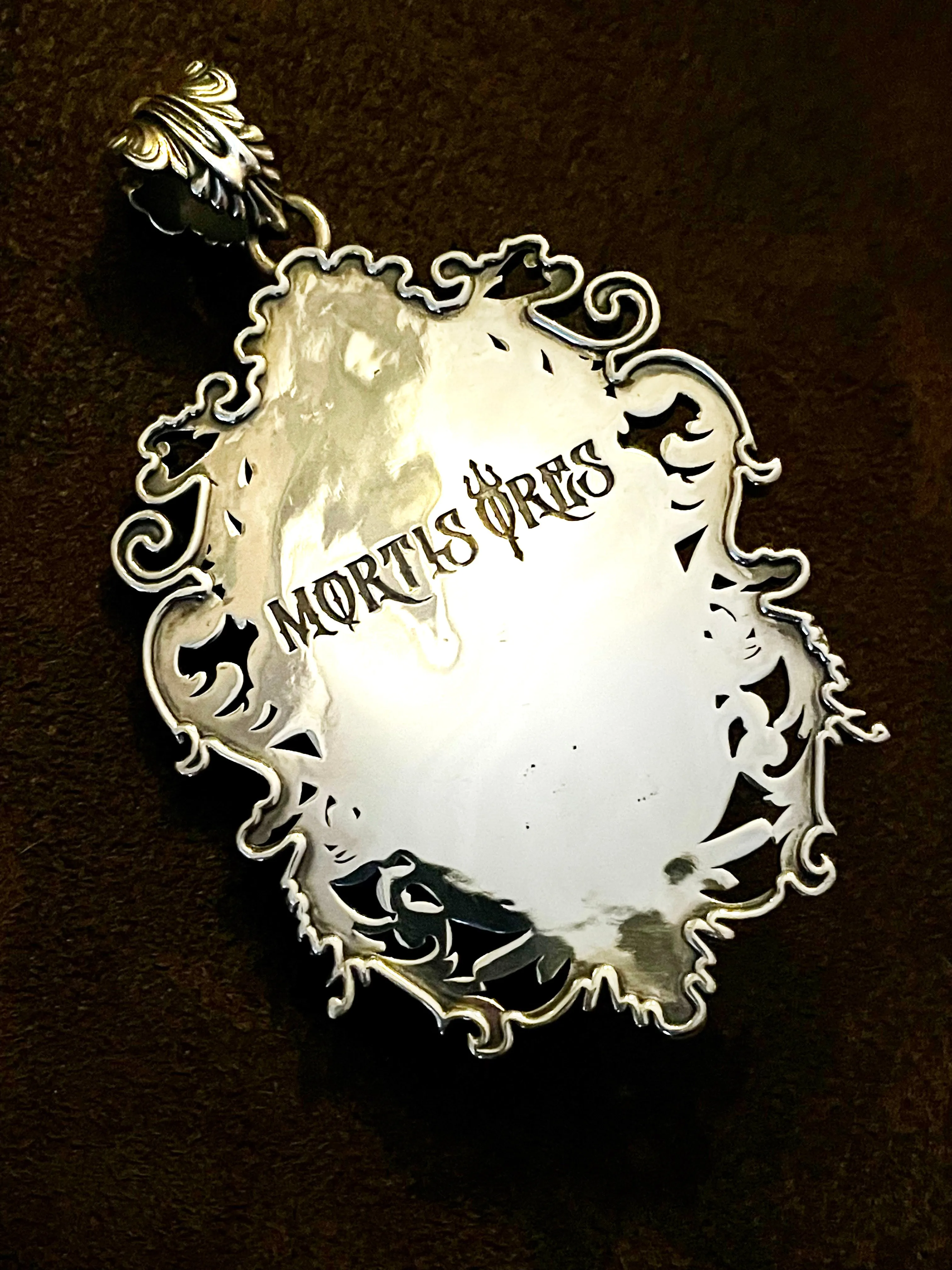 Mirror of Mortis Skull Amulet