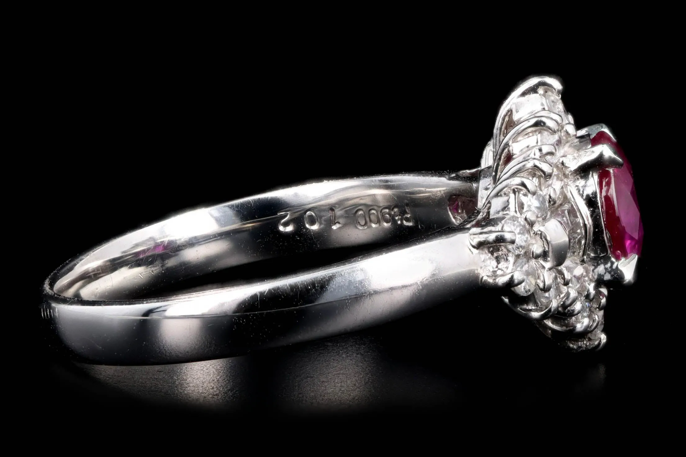 Retro Platinum 1.02 Carat Round Natural Ruby & Diamond Tapered Baguette Halo Ring