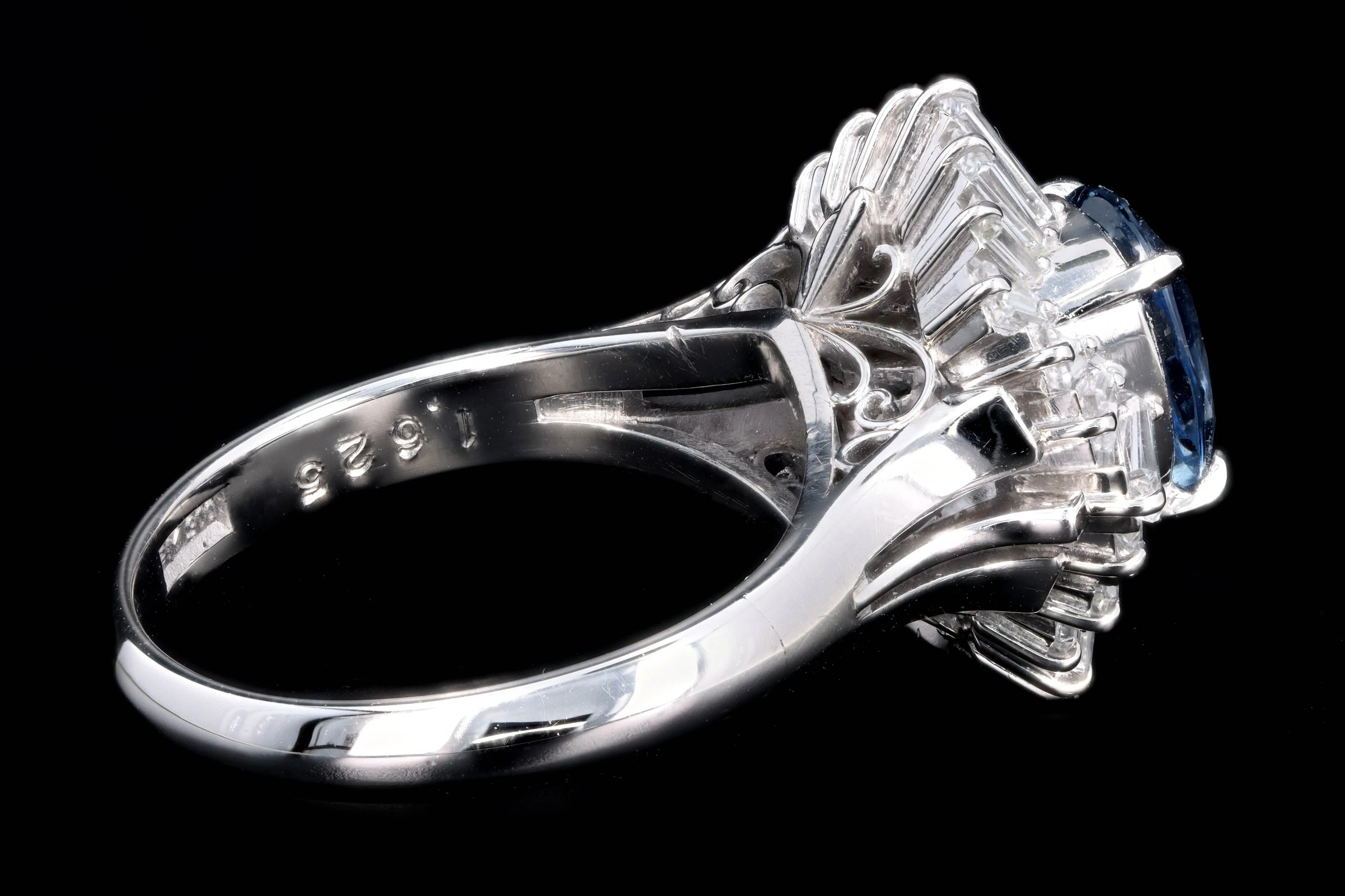 Retro Platinum 2.17 Carat Natural Sapphire & Tapered Baguette Diamond Ring