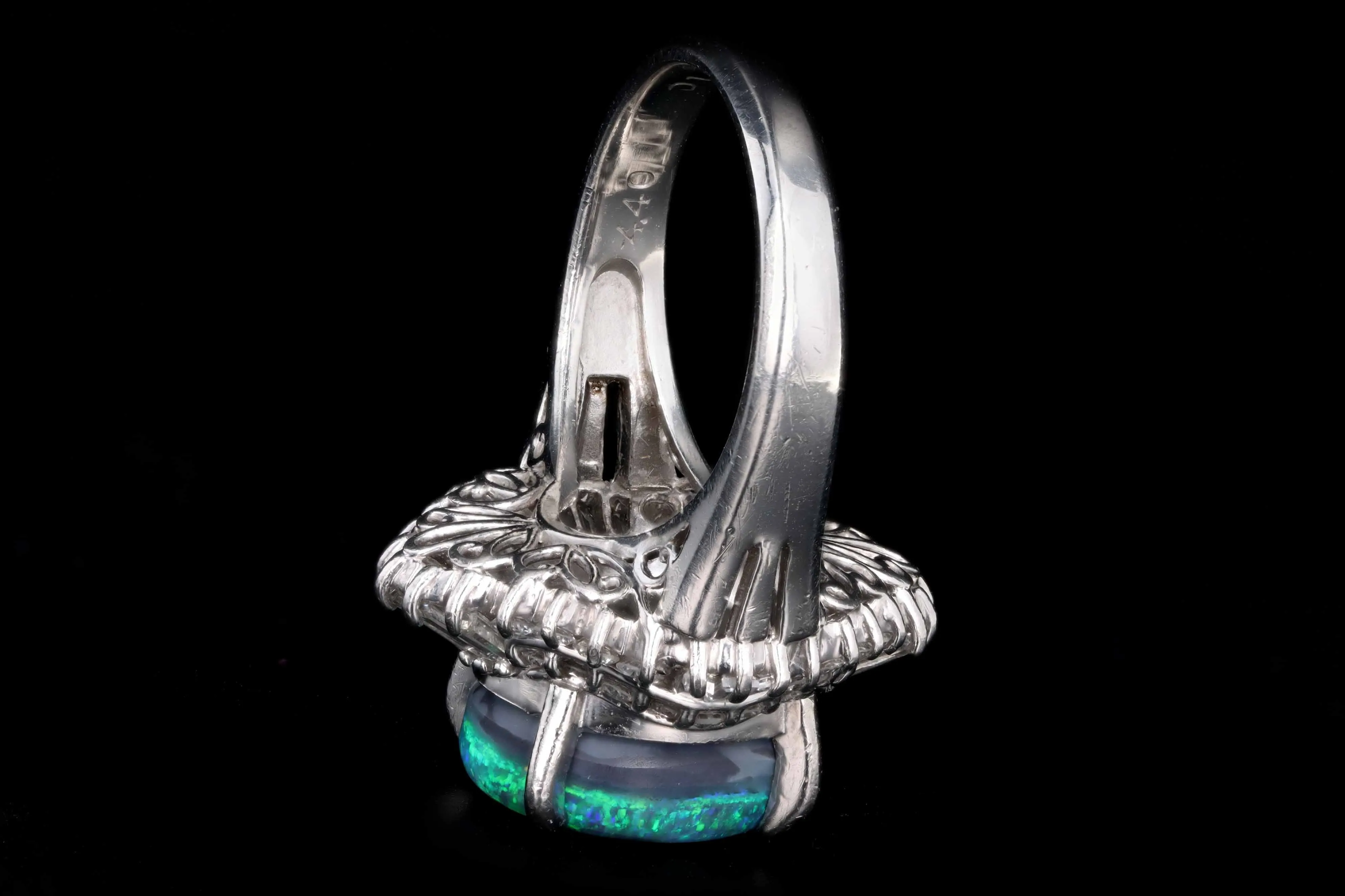 Retro Platinum 4.40 Carat Black Opal & Tapered Baguette Ballerina Ring