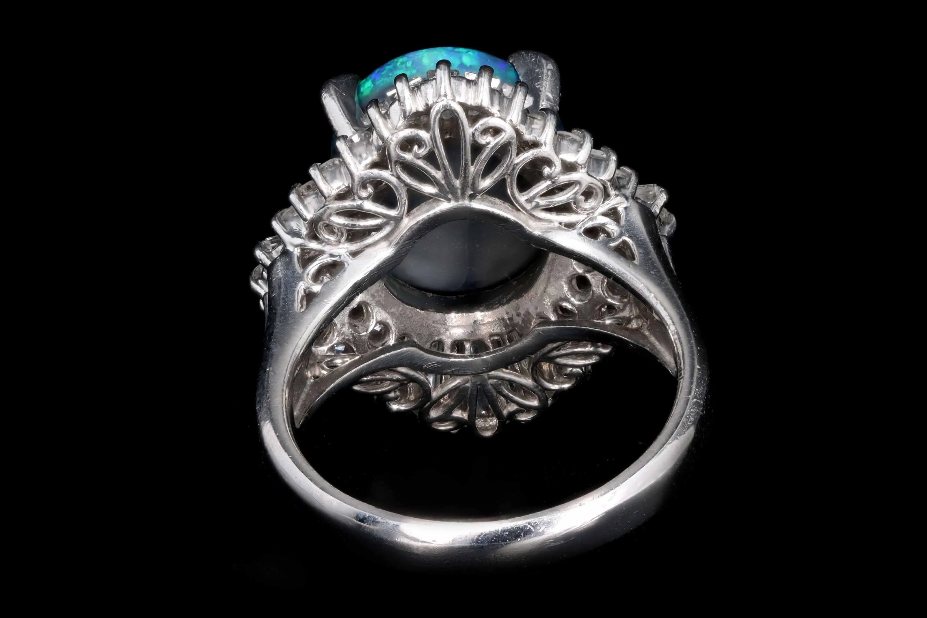 Retro Platinum 4.40 Carat Black Opal & Tapered Baguette Ballerina Ring
