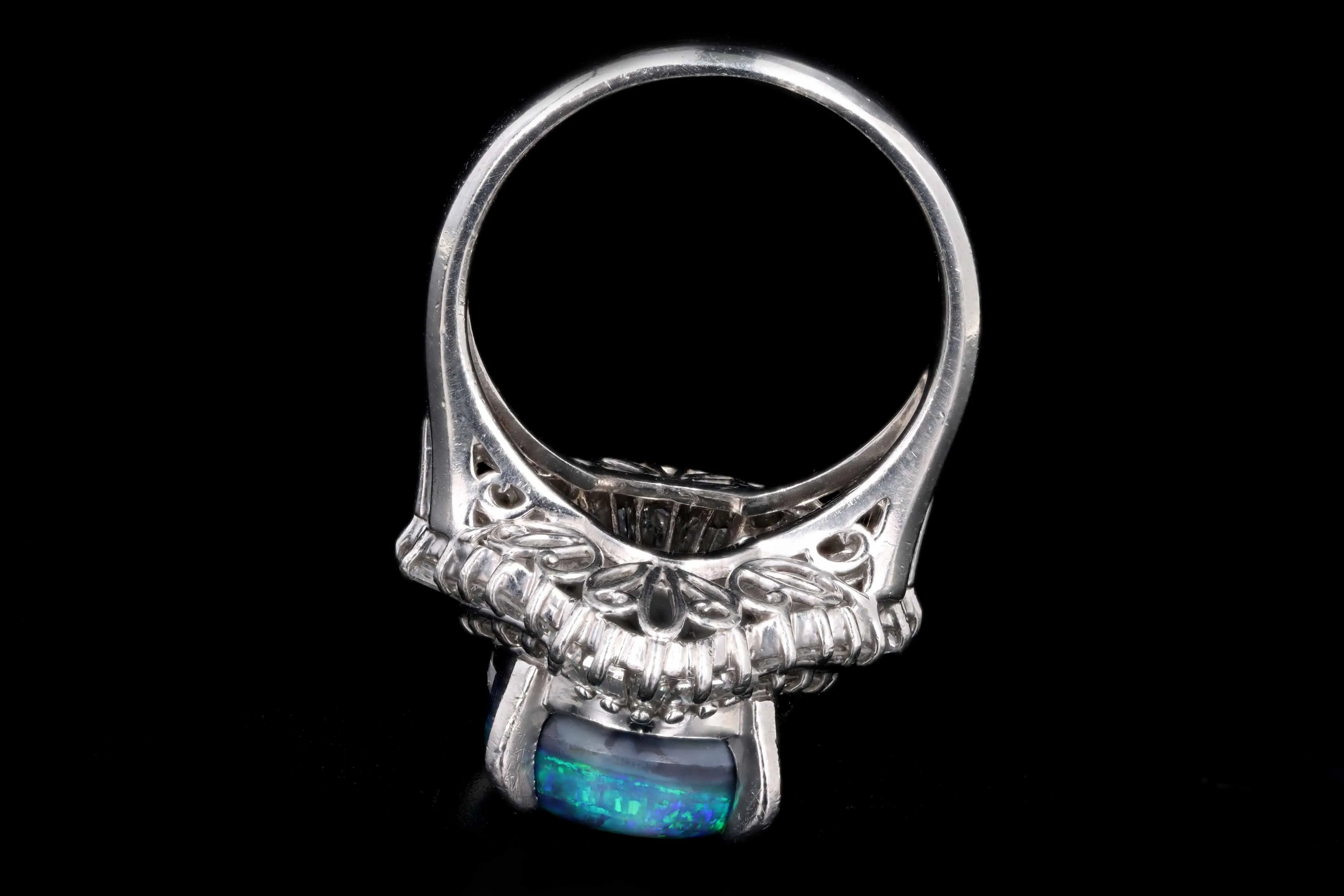 Retro Platinum 4.40 Carat Black Opal & Tapered Baguette Ballerina Ring
