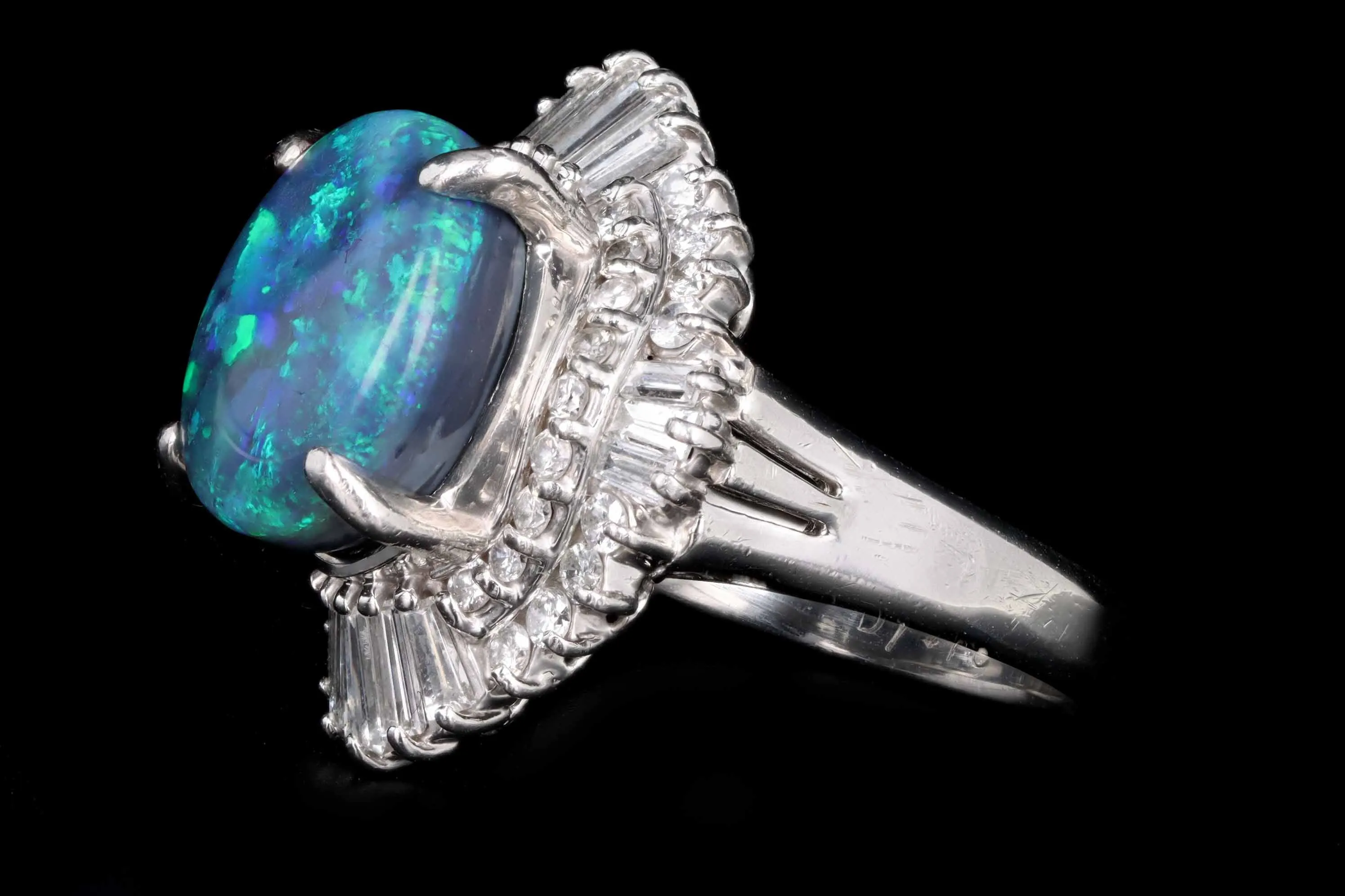 Retro Platinum 4.40 Carat Black Opal & Tapered Baguette Ballerina Ring