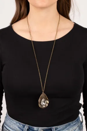 Surrealist Sparkle - Brass - White Gem Warped Pendant Paparazzi Long Necklace