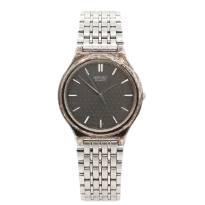 Vintage Seiko V701-1P70 Honeycomb Dial Men's Quartz Wristwatch Japan Steel